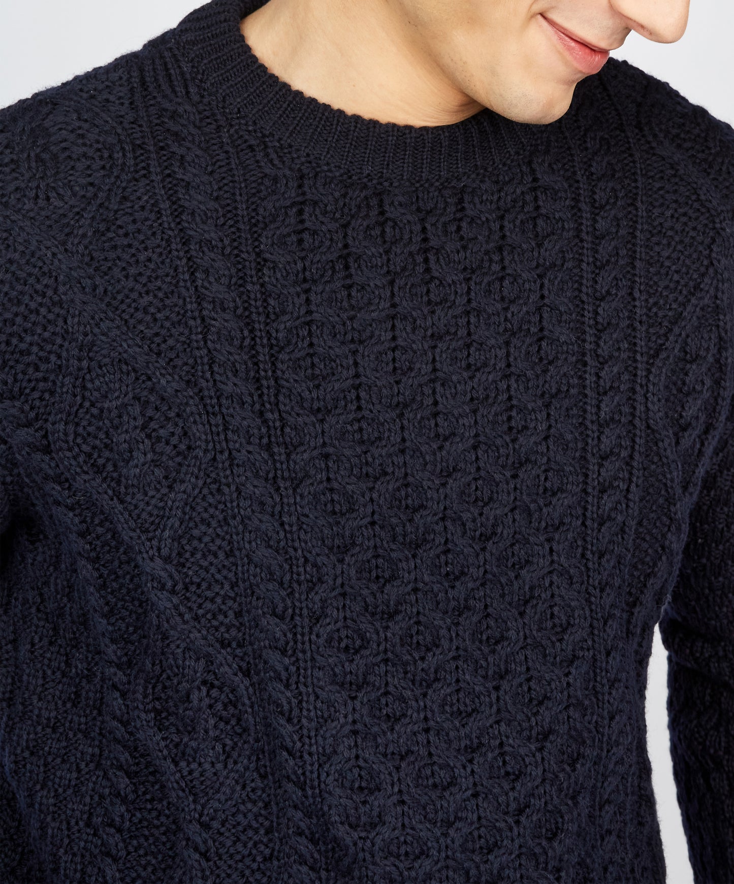 IrelandsEye Knitwear Fearnóg Aran Crew Neck Sweater in Navy Merino