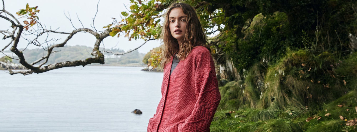 IrelandsEye Knitwear Thistle_Cable_Knit_Sleeves_Button_Cardigan_in_Coral_Donegal_Luxe_Melange
