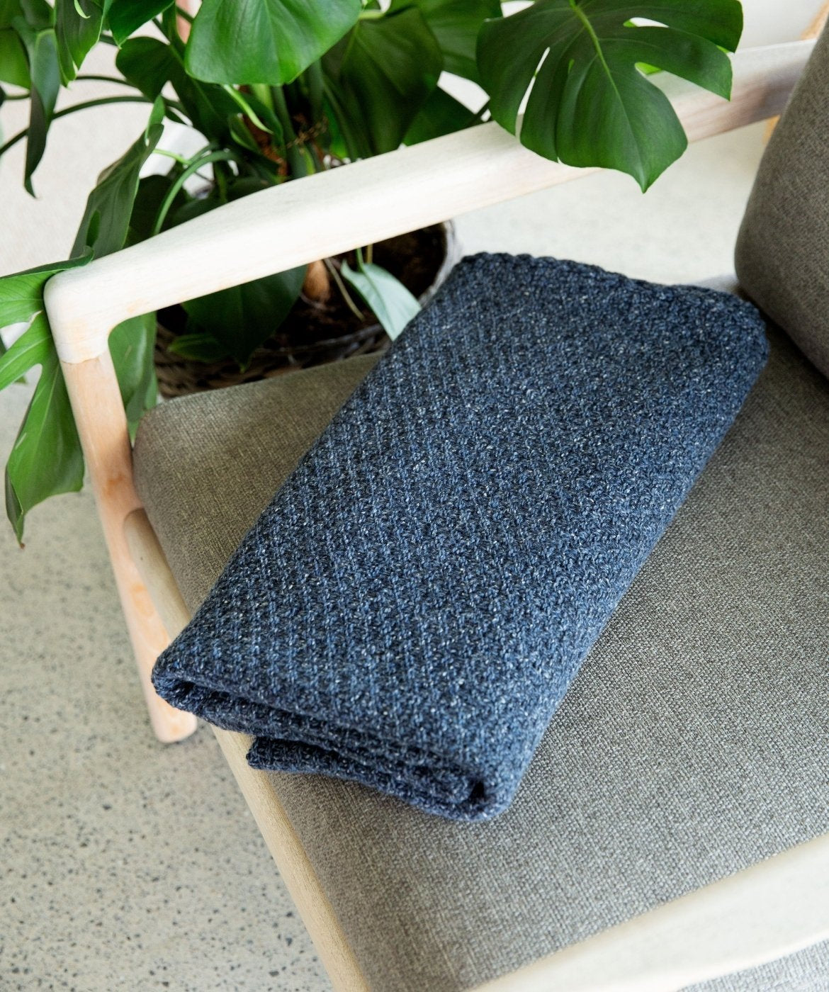Moss Textured Throw in Dark Denim Donegal Luxe Melange